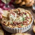 Irresistible smoked gouda bacon dip, a creamy bacon bliss, is showcased in this featured image.