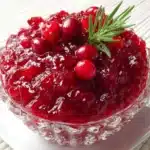 Easy homemade Christmas cranberry sauce adds a burst of tart and sweet flavor to your holiday meal and is simple to make with fresh cranberries, sugar, and orange zest.