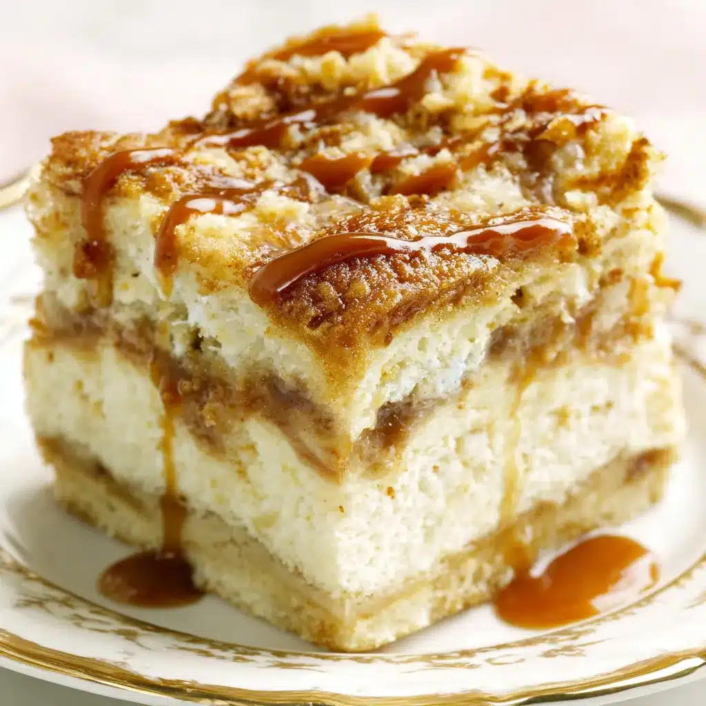 Close-up of delicious Caramel Apple Cheesecake Bars showcasing layers of graham cracker crust, creamy cheesecake filling, sweet caramel drizzle, and chunks of juicy apples, perfect for fall baking.