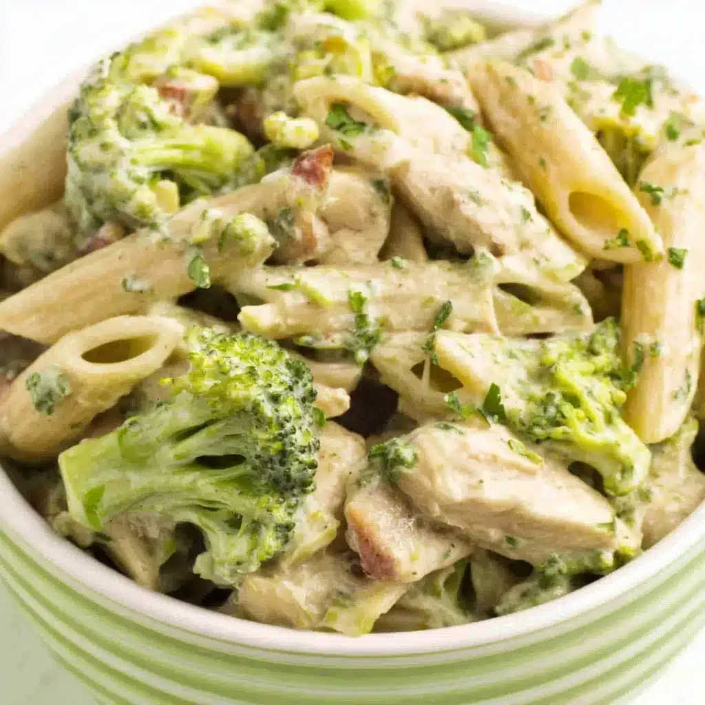 Broccoli Chicken Penne Recipe Close-up shot showcasing a delicious plate of Broccoli And Chicken Penne, highlighting the creamy sauce and tender chicken pieces.