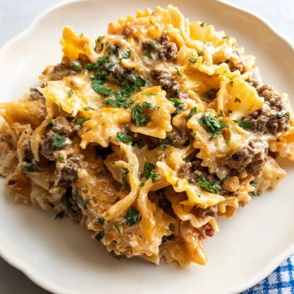 Hobo Casserole Ground Beef Closeup Close-up image of a freshly baked Hobo Casserole Ground Beef, showcasing its golden-brown topping and savory filling.
