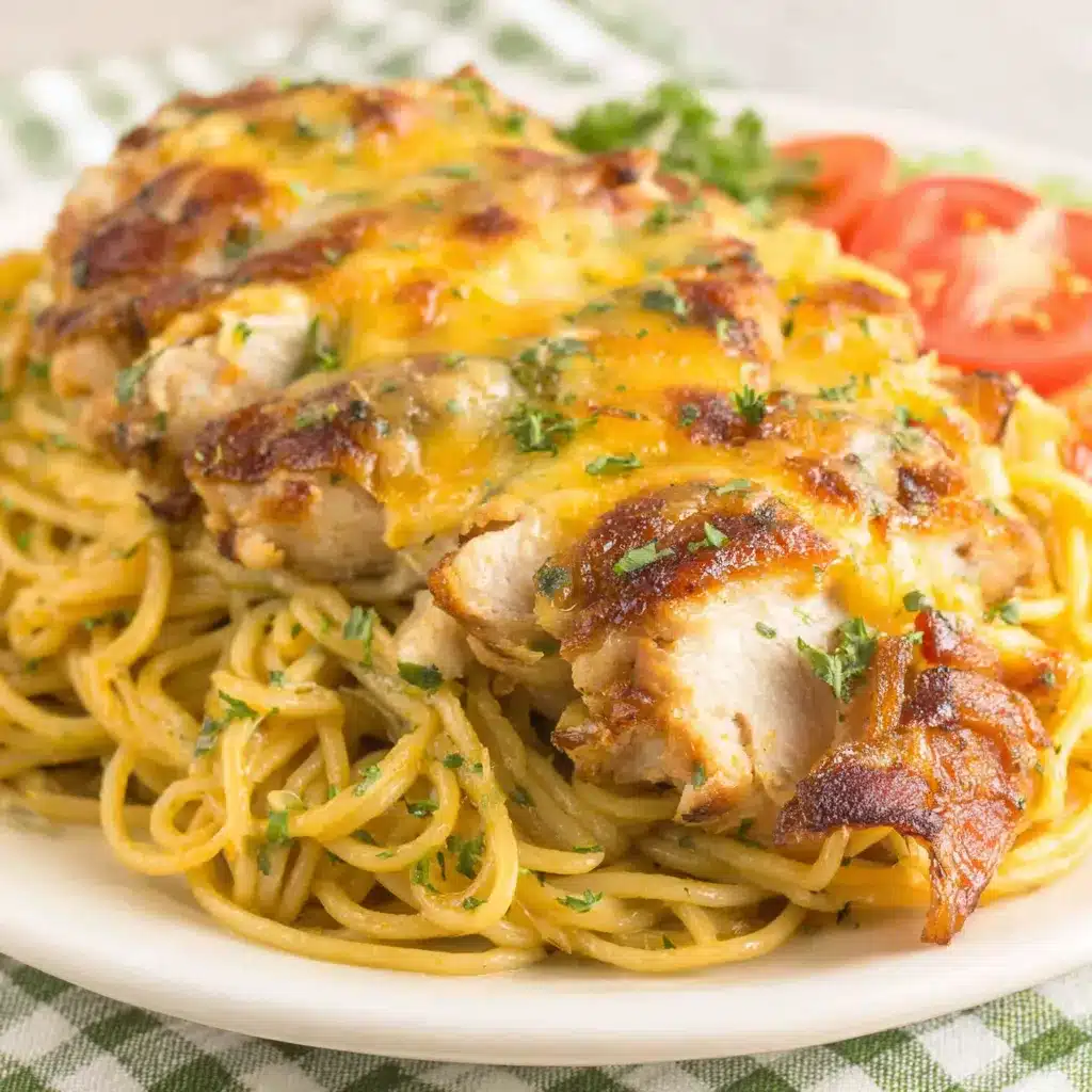 Monterey Chicken Spaghetti Closeup A close-up showcases the creamy texture and cheesy topping of Monterey Chicken Spaghetti, inviting viewers to try this delicious recipe.