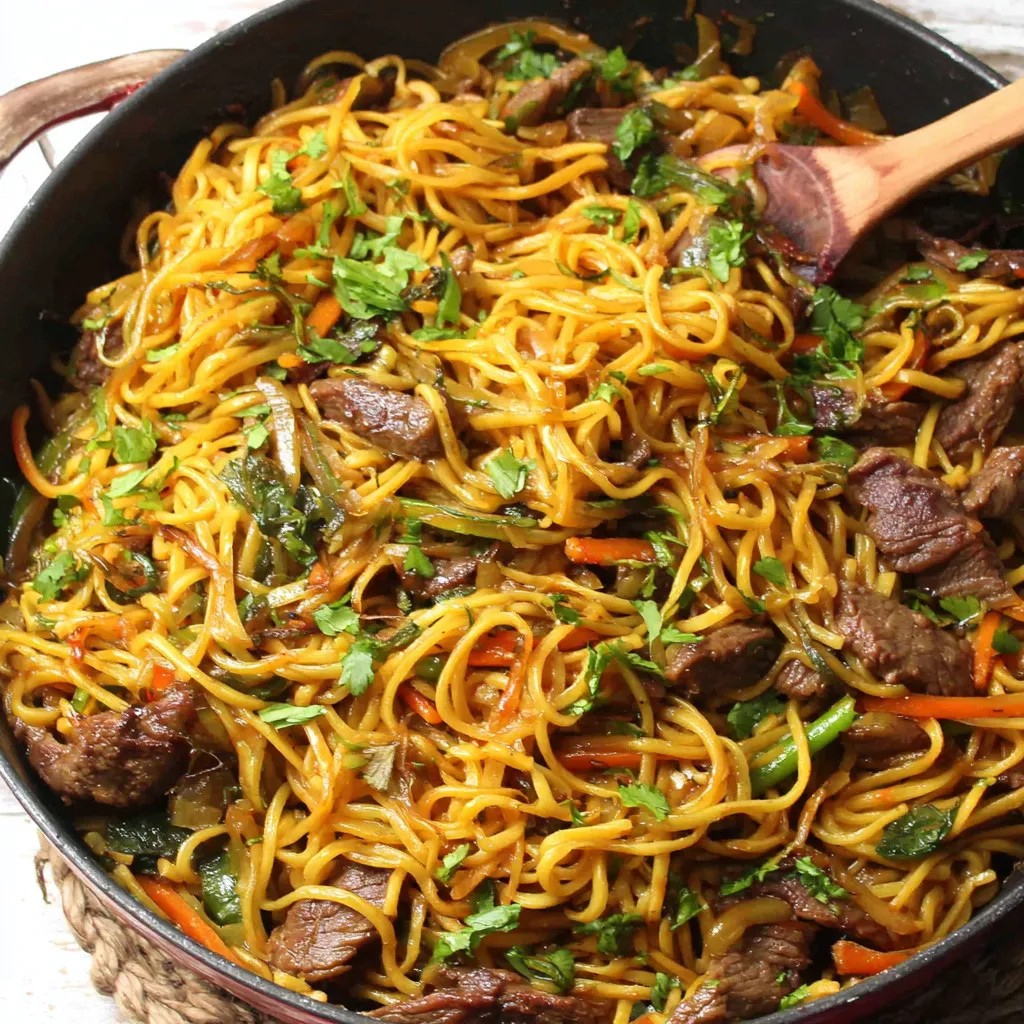 A mouthwatering featured image showcasing perfectly cooked Sticky Beef Noodles.