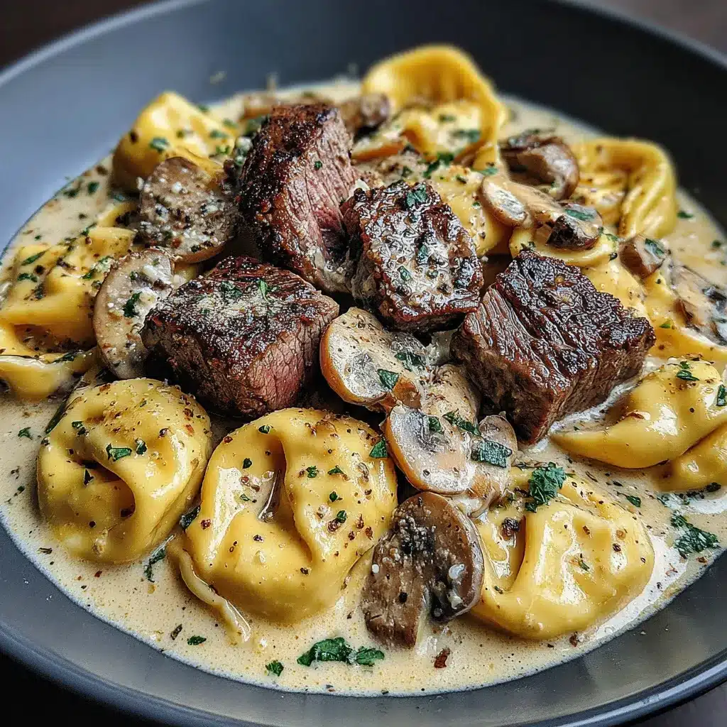 Garlic Steak Tortellini Close-Up A close-up shot showcases a delicious serving of Garlic Steak Tortellini, highlighting the creamy sauce and tender steak pieces.