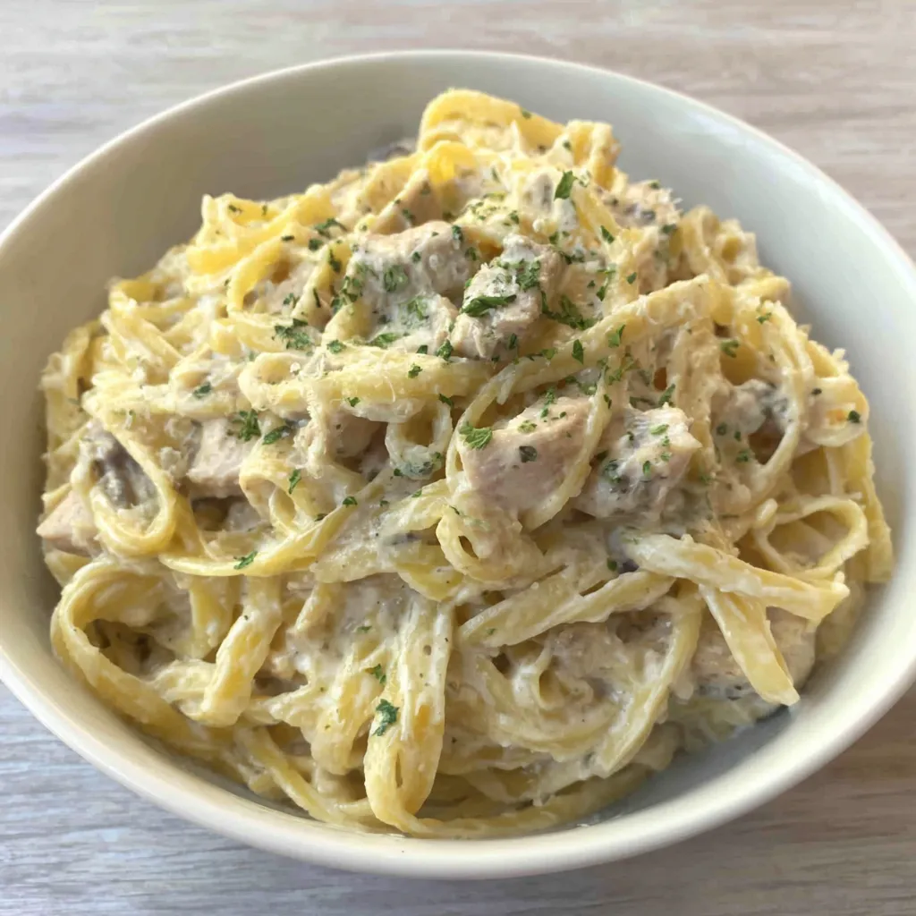 Creamy Chicken Alfredo, a rich and decadent pasta dish, is showcased as the featured image.