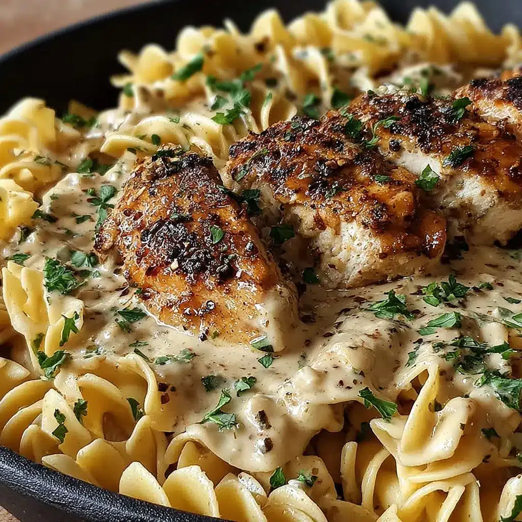 Creamy Garlic Butter Chicken With Egg Noodles, a featured image showing the delicious dish.